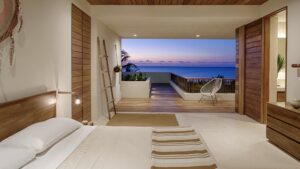 Casa Xixim at dusk with pool view shows why is Tulum better than Cancun clearly