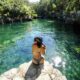 jorge-fernandez-salas-Mexican Caribbesan Travel woman sitting on rockunsplash