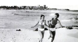 People running on beach in Riviera Maya