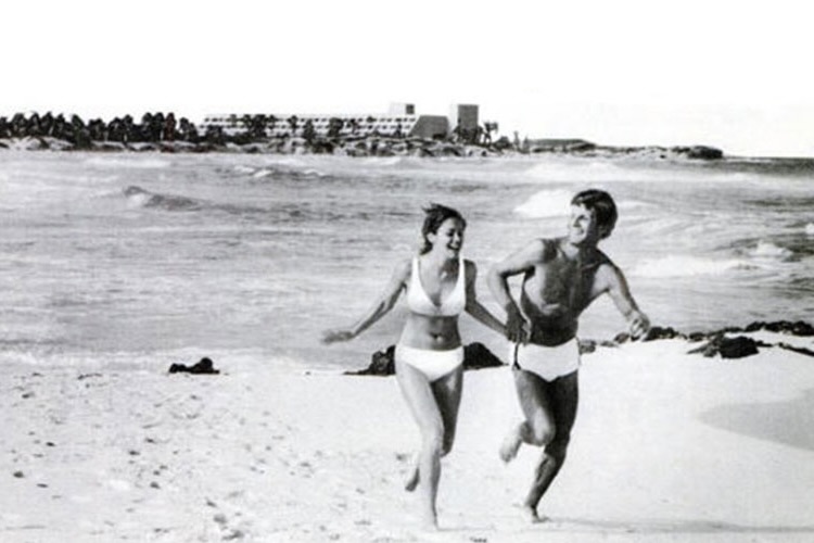 People running on beach in Riviera Maya