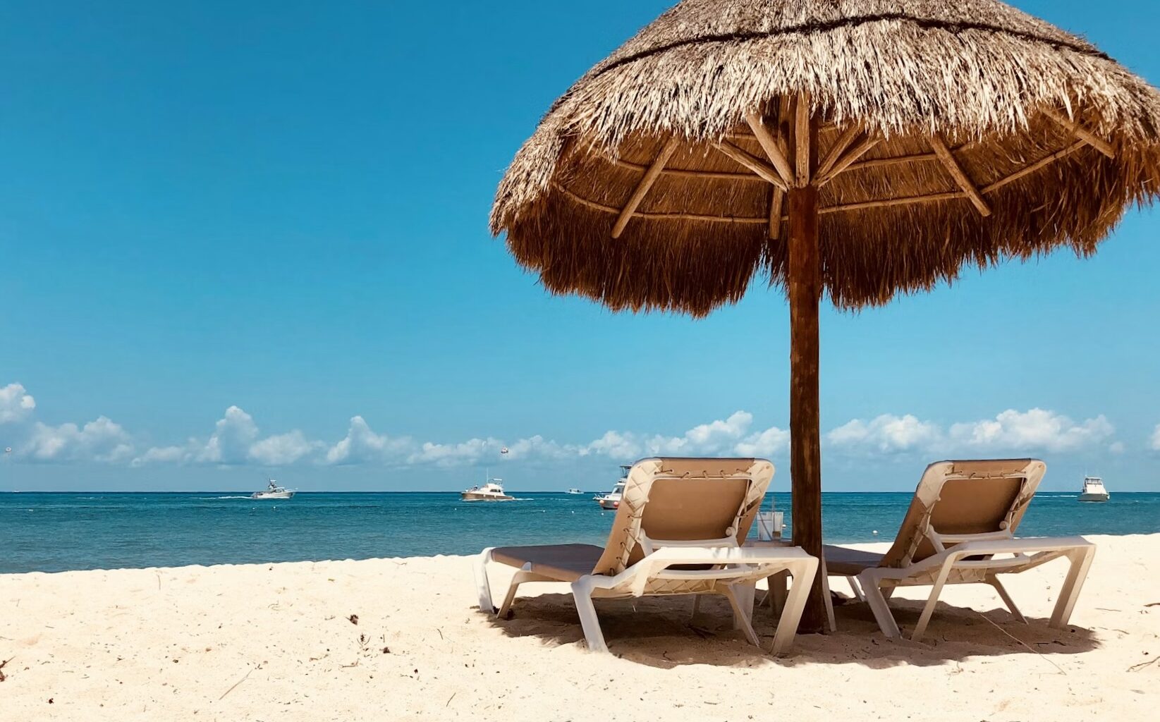 The Travel Nook The best beaches in Cozumel bech umbrella