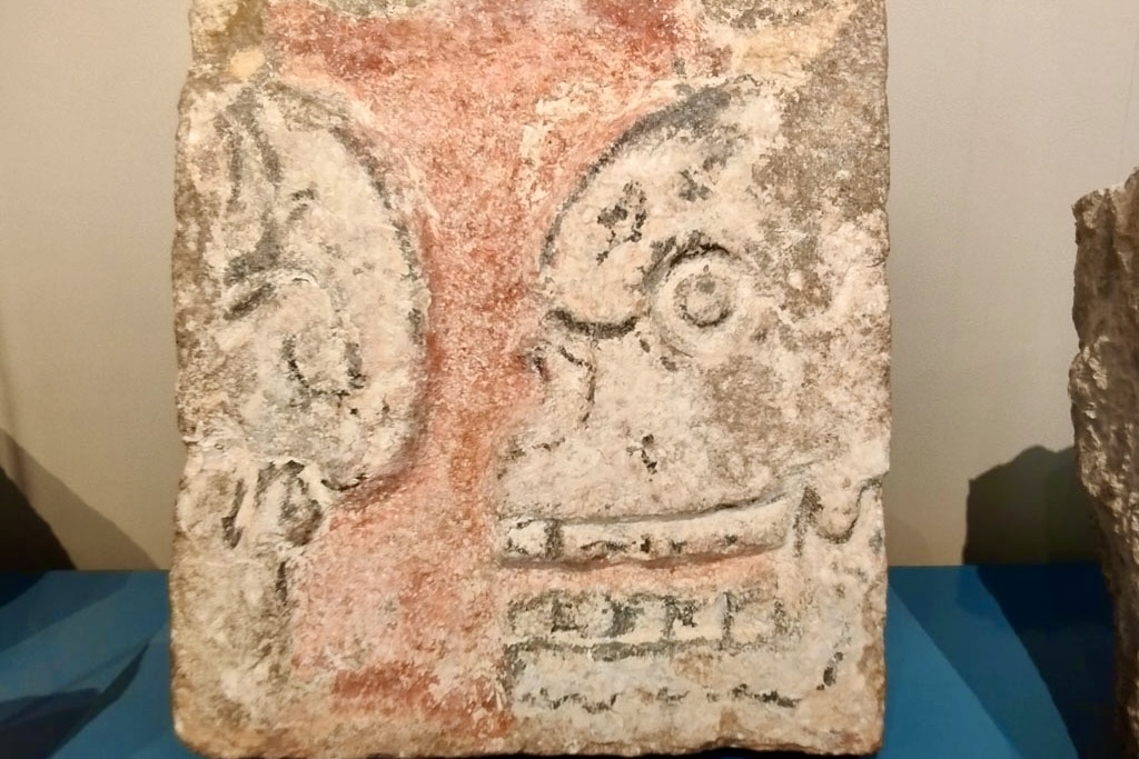 Tzompantli stione with skull