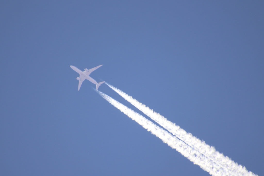 Riviera Maya Tourism Boom aircraft flying high Photo Yucatán Magazine