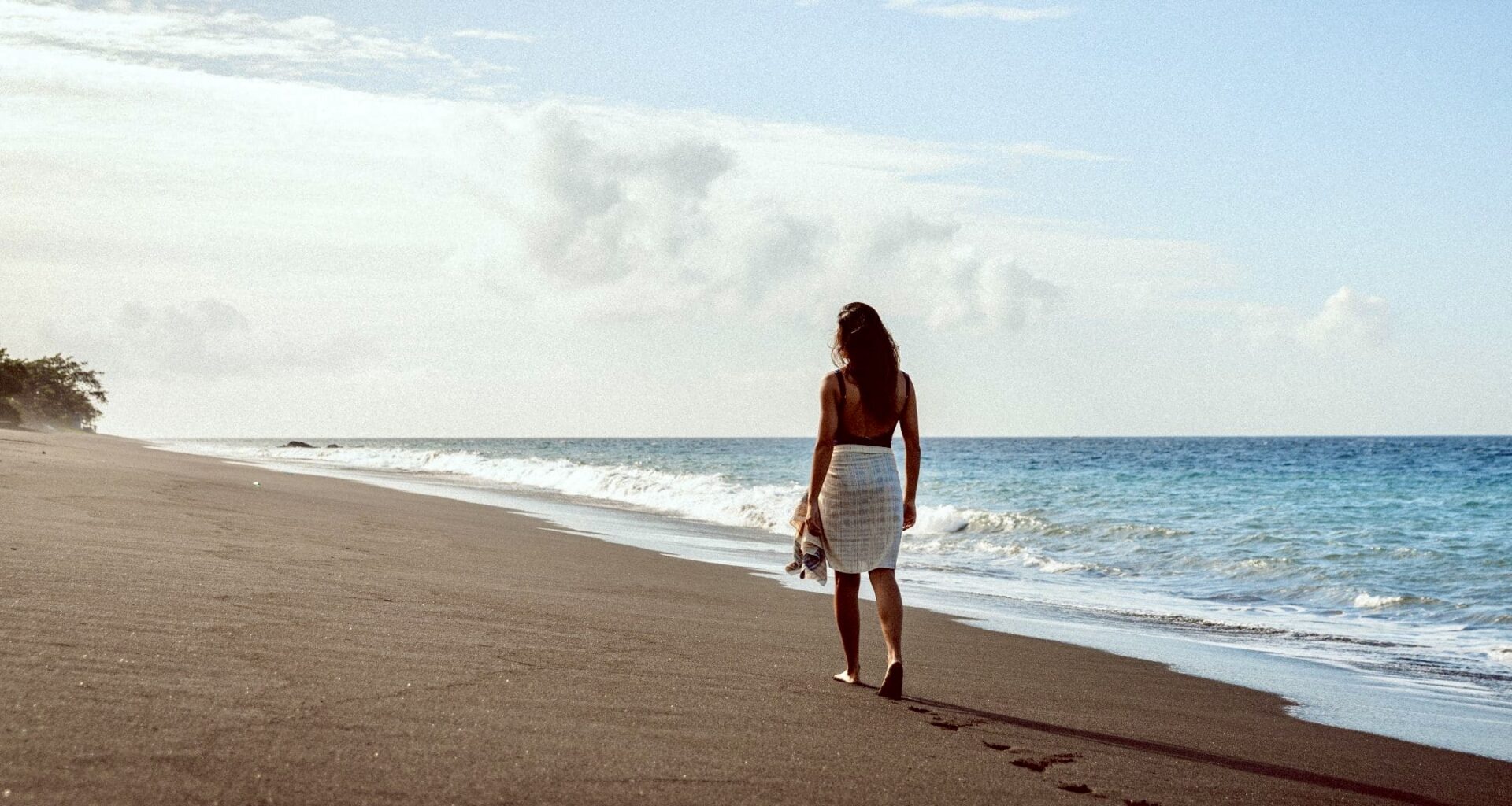 Alila Mayakoba woman walking on beach New Five-Star Hotels in Riviera Maya